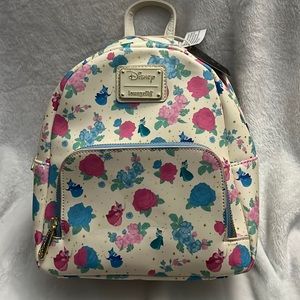 Sleeping beauty fairy loungefly never been used!